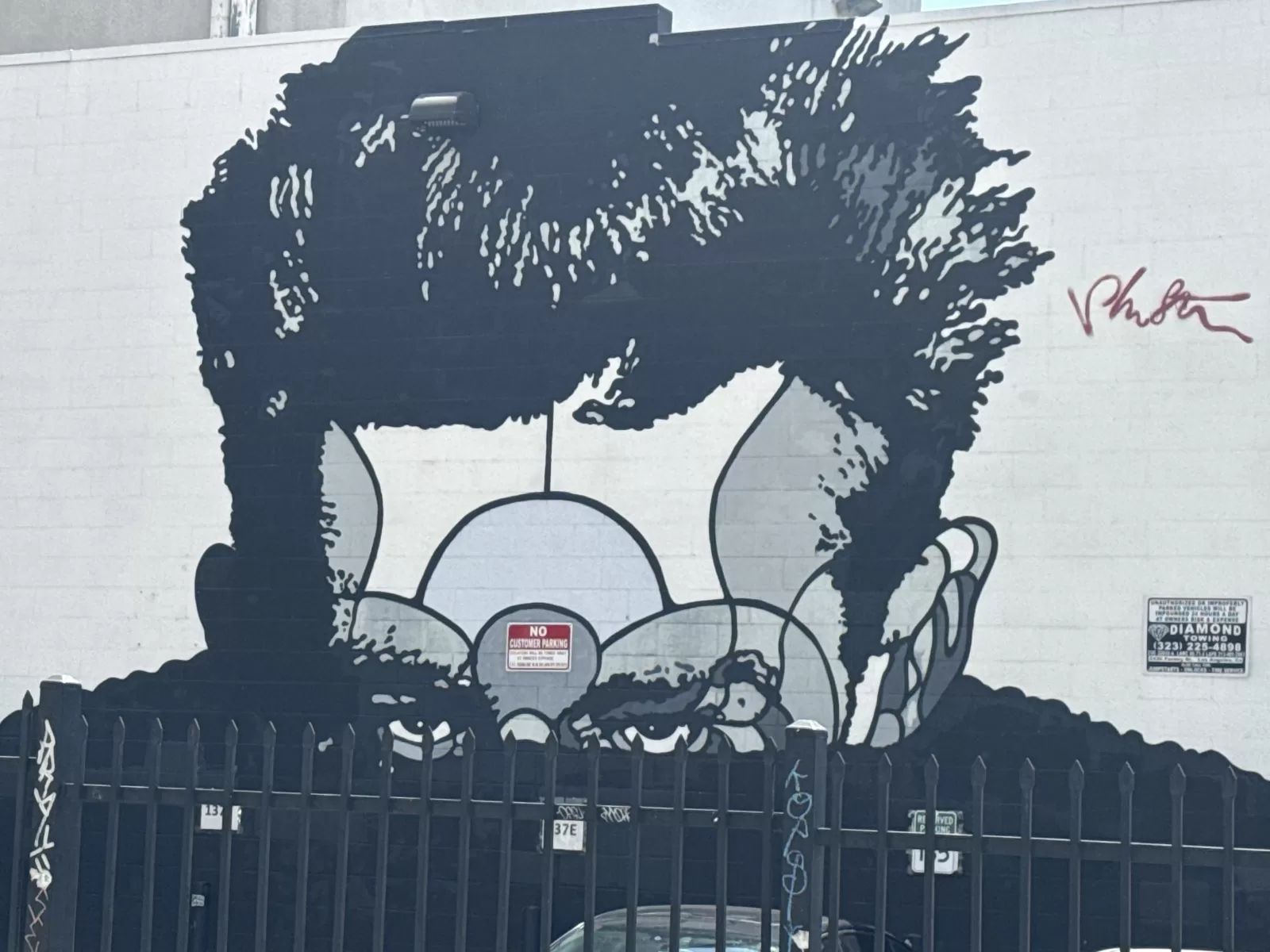 Man faces on wall